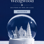 Collection de Noël Wedgwood avec des pièces en porcelaine élégantes sur une table décorée.