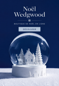 Collection de Noël Wedgwood avec des pièces en porcelaine élégantes sur une table décorée.