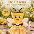 Décorations de Pâques créées avec des pots en terre cuite colorés et fleuris.