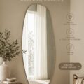 Miroir moderne en verre avec un cadre minimaliste dans un intérieur élégant.