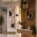Mur décoré avec des œuvres d'art et des éléments naturels, créant une ambiance chaleureuse.